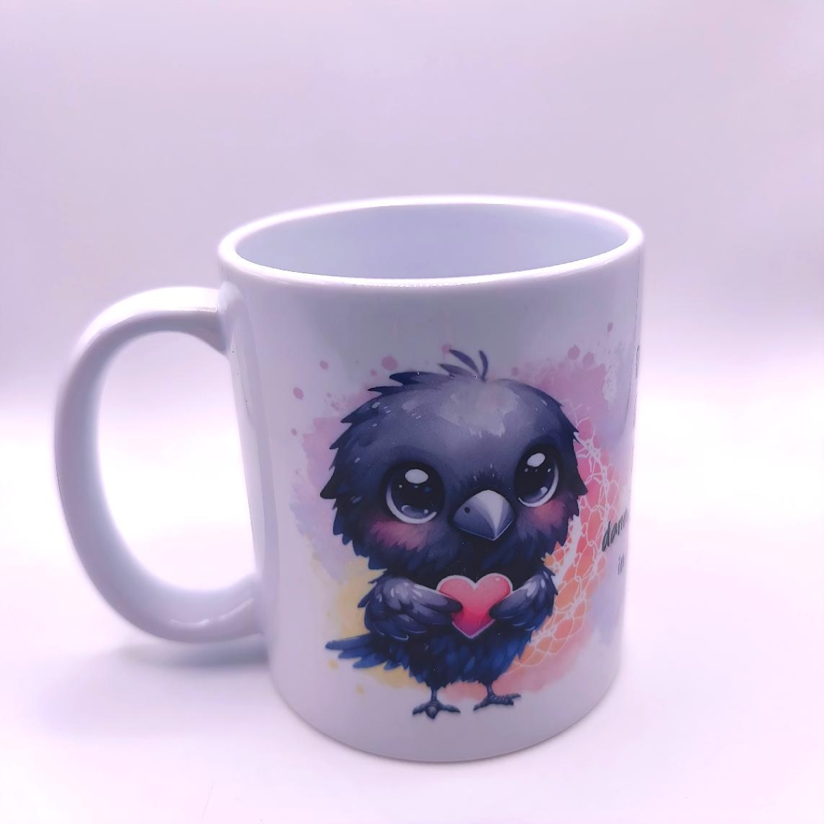 Kleine Krähe mit Herz Tasse